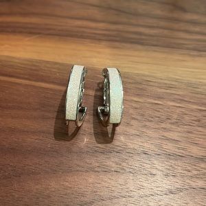 Opalescent sparkly fifth avenue hoop earrings.
